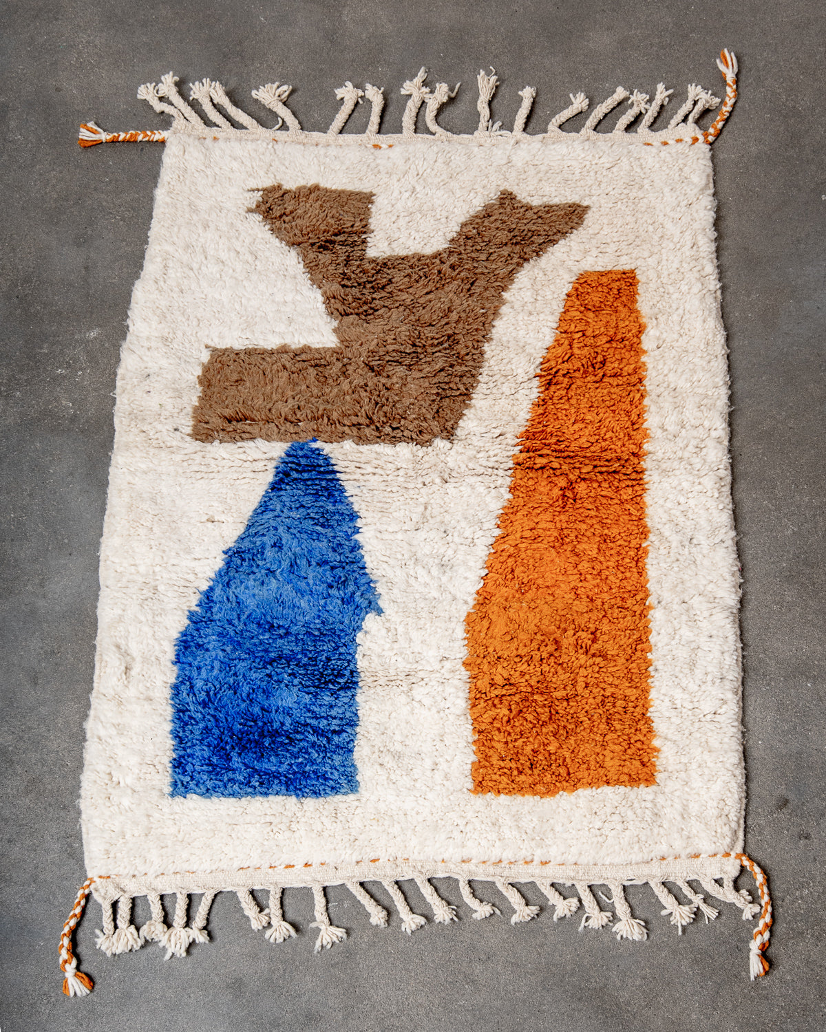 Modern, designer, handcrafted Berber rug from Morocco. Beniourain carpet with beautiful colours and patterns and fluffy wool texture.